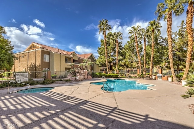 2120 Ramrod Ave Unit 2216, Henderson, NV 89014 - community pool featuring a patio area and fence