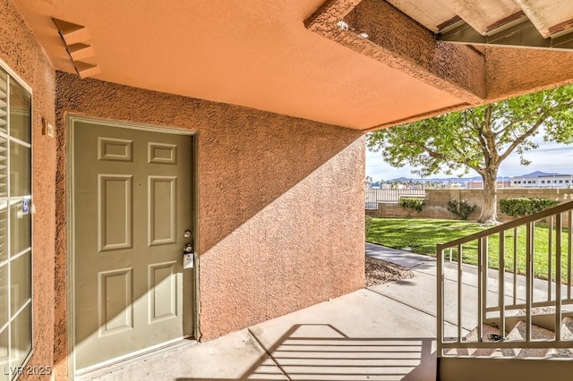 2120 Ramrod Ave Unit 2216, Henderson, NV 89014 - property entrance with a yard and stucco siding