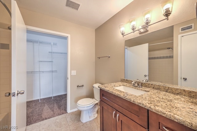 2120 Ramrod Ave Unit 2216, Henderson, NV 89014 - full bathroom with visible vents, toilet, a shower, vanity, and tile patterned flooring