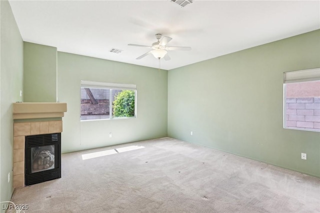 3029 Paseo Hills Way, Henderson, NV 89052 - unfurnished living room with a ceiling fan, carpet flooring, and a fireplace