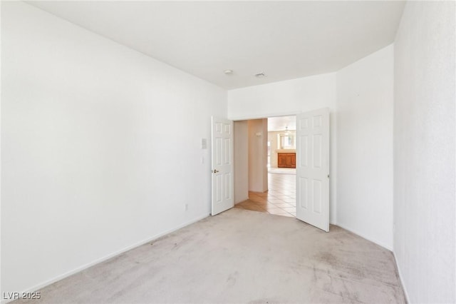 3029 Paseo Hills Way, Henderson, NV 89052 - spare room featuring light colored carpet and baseboards