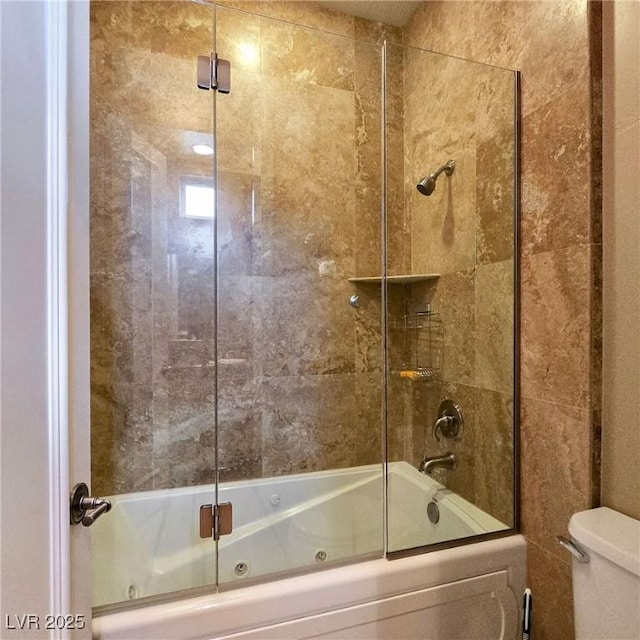 full bathroom with toilet and a combined bath / shower with jetted tub