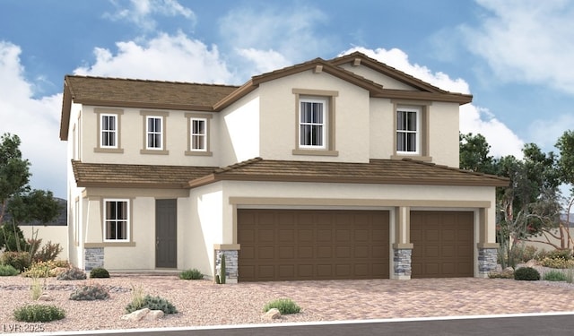 traditional-style home with driveway, a garage, and stucco siding