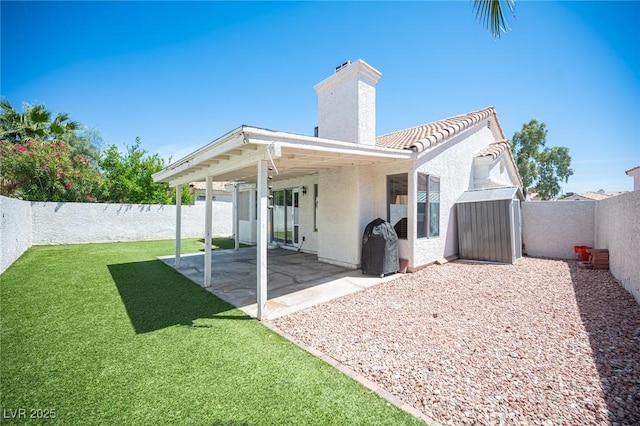 7103 Shadow Crest Dr, Las Vegas, NV 89119 - back of property featuring a chimney, stucco siding, a patio, and a tiled roof
