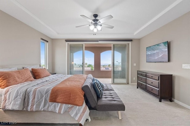 342 Molinetto St, Las Vegas, NV 89138 - bedroom featuring access to outside, baseboards, light carpet, a raised ceiling, and ceiling fan