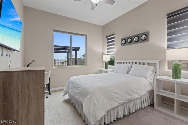 342 Molinetto St, Las Vegas, NV 89138 - bedroom featuring light colored carpet, baseboards, and a ceiling fan