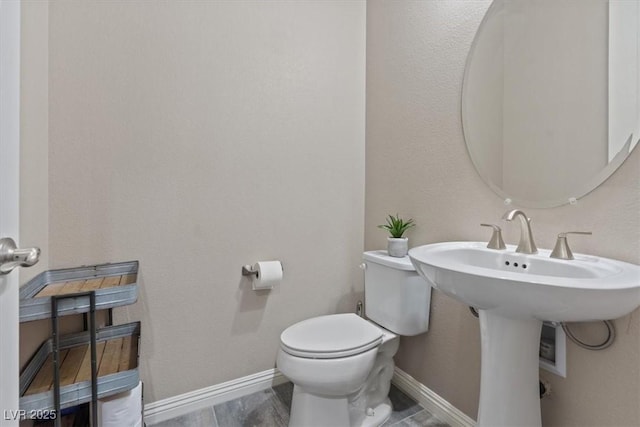 342 Molinetto St, Las Vegas, NV 89138 - half bathroom with toilet and baseboards