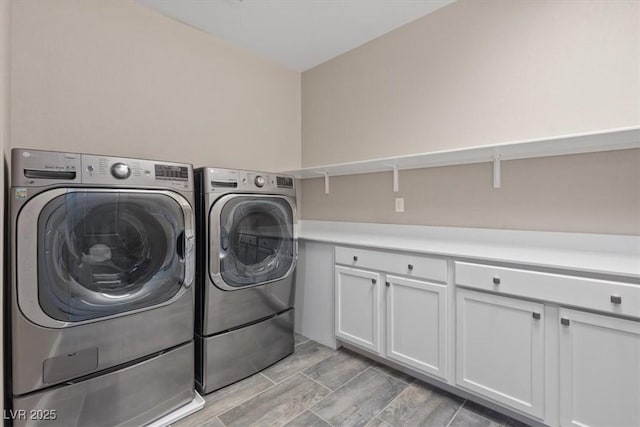 342 Molinetto St, Las Vegas, NV 89138 - washroom featuring cabinet space, separate washer and dryer, and wood tiled floor