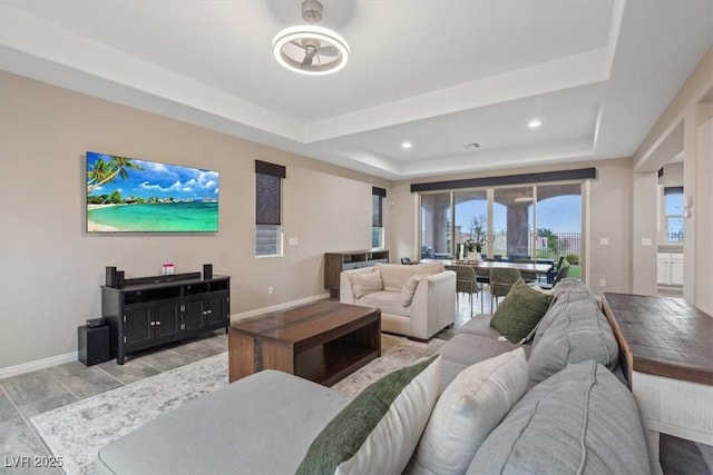 342 Molinetto St, Las Vegas, NV 89138 - living area featuring a raised ceiling, baseboards, and recessed lighting