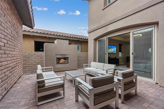 342 Molinetto St, Las Vegas, NV 89138 - view of patio featuring an outdoor living space with a fireplace