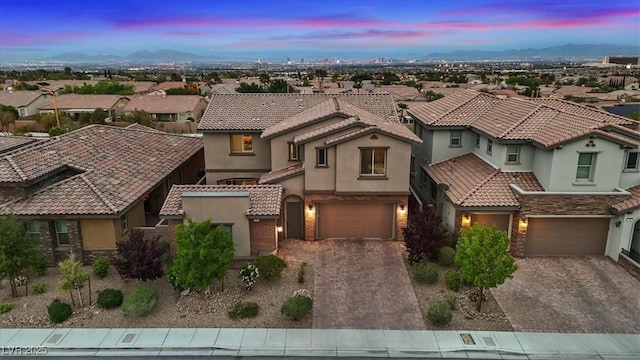 342 Molinetto St, Las Vegas, NV 89138 - view of front facade featuring a tile roof, a residential view, and stucco siding