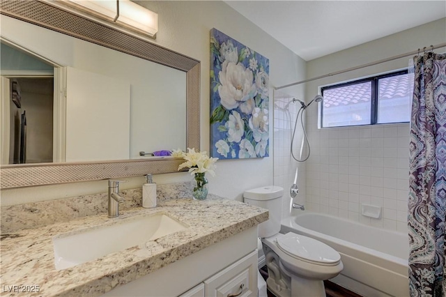 bathroom featuring toilet, vanity, and shower / bath combination with curtain