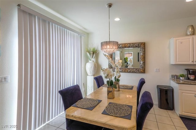 dining space with recessed lighting and light tile patterned flooring