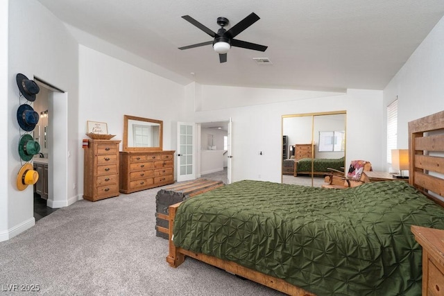 6973 Pacific Coast St, Las Vegas, NV 89148 - carpeted bedroom featuring a closet, visible vents, vaulted ceiling, french doors, and baseboards