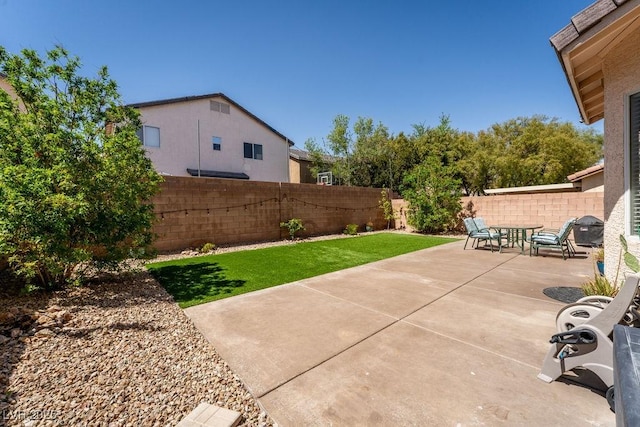 6973 Pacific Coast St, Las Vegas, NV 89148 - view of patio featuring a fenced backyard