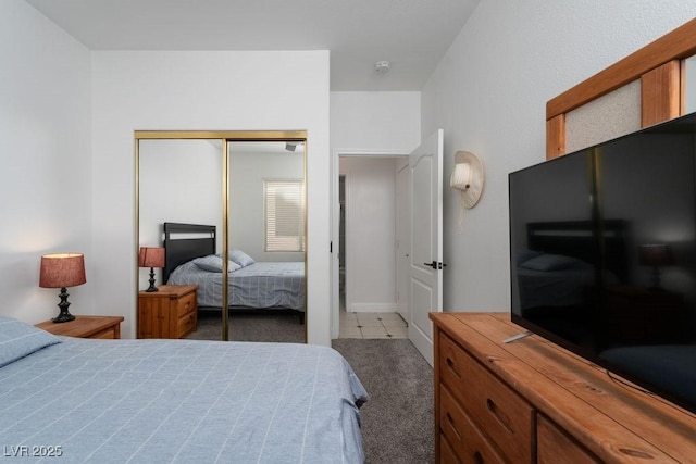6973 Pacific Coast St, Las Vegas, NV 89148 - bedroom with carpet, a closet, and baseboards
