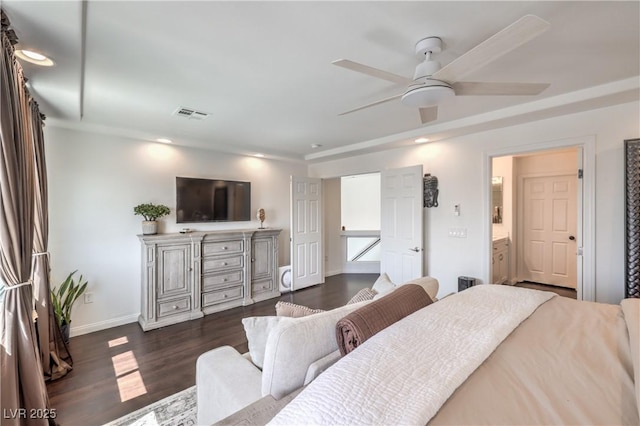 bedroom with dark wood-type flooring, visible vents, baseboards, and recessed lighting