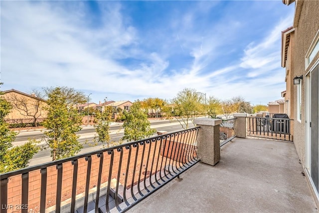 balcony featuring a residential view