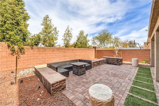 view of patio with a fenced backyard