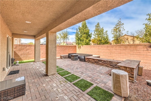 view of patio / terrace with a fenced backyard