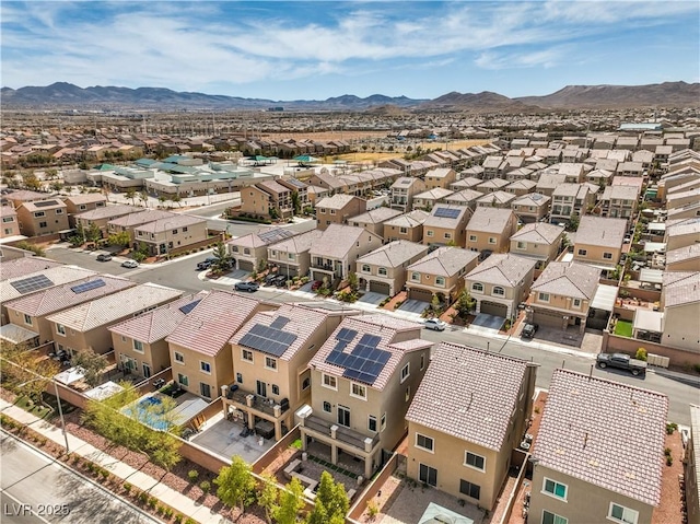 drone / aerial view with a mountain view and a residential view