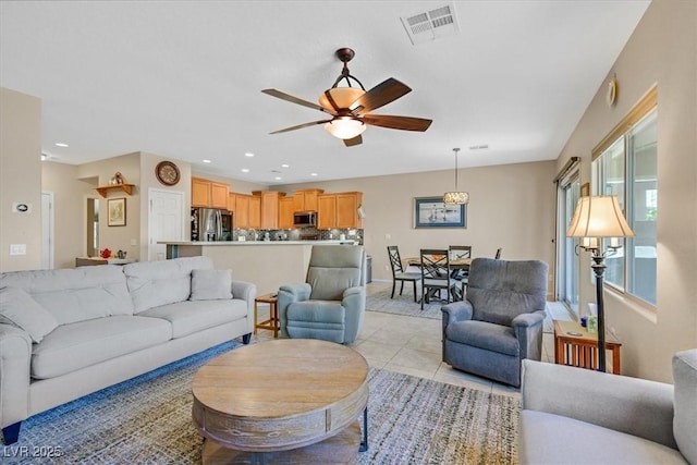 6072 Canter Glen Ave, Las Vegas, NV 89122 - living room with visible vents, baseboards, recessed lighting, a ceiling fan, and light tile patterned floors