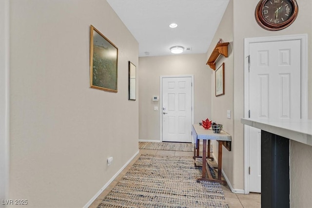 6072 Canter Glen Ave, Las Vegas, NV 89122 - hallway with baseboards and light tile patterned floors