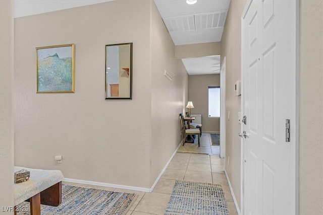 6072 Canter Glen Ave, Las Vegas, NV 89122 - corridor with light tile patterned flooring and baseboards