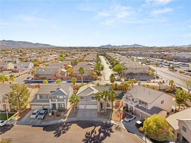 aerial view with a mountain view and a residential view