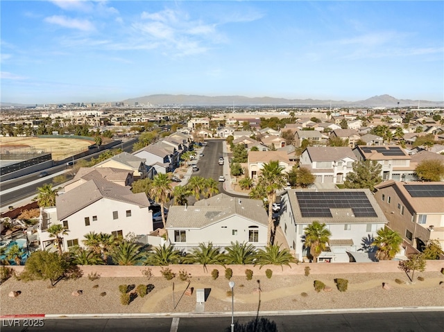 drone / aerial view with a mountain view and a residential view