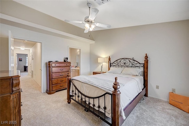 2851 S Valley View Blvd Unit 1139B, Las Vegas, NV 89102 - bedroom featuring light colored carpet, a ceiling fan, visible vents, and connected bathroom