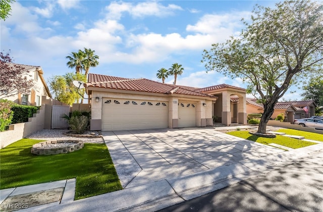4176 Skywalker Ave, Las Vegas, NV 89120 - mediterranean / spanish-style home featuring stucco siding, a tile roof, an attached garage, and concrete driveway
