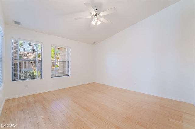 4176 Skywalker Ave, Las Vegas, NV 89120 - spare room featuring light wood-type flooring, lofted ceiling, baseboards, and a ceiling fan