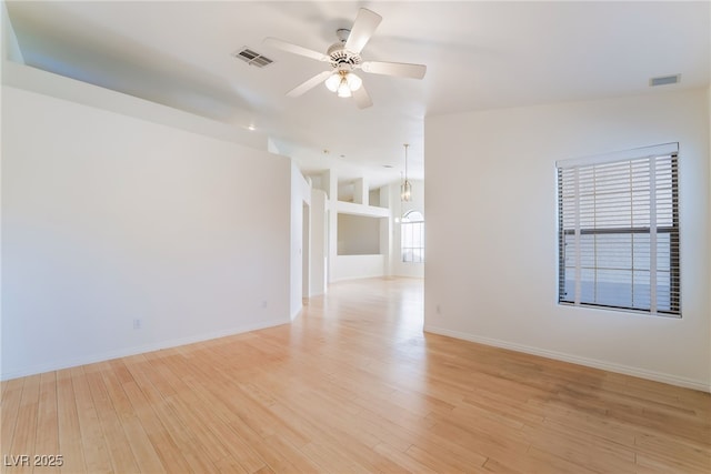 4176 Skywalker Ave, Las Vegas, NV 89120 - unfurnished room featuring a ceiling fan, light wood-style floors, and baseboards