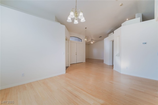 4176 Skywalker Ave, Las Vegas, NV 89120 - unfurnished room featuring a chandelier, light wood-type flooring, and baseboards