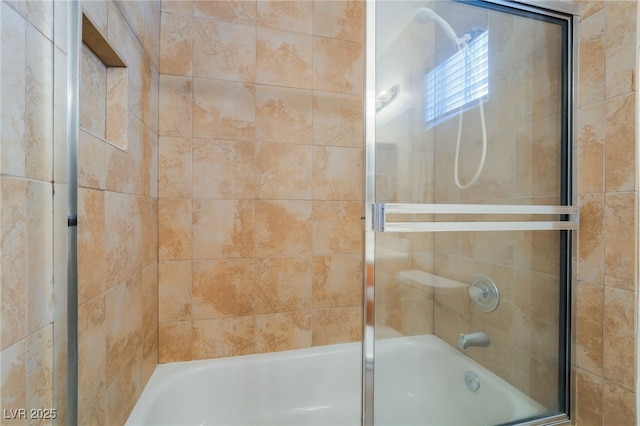 4176 Skywalker Ave, Las Vegas, NV 89120 - bathroom featuring bath / shower combo with glass door