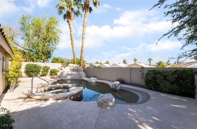 4176 Skywalker Ave, Las Vegas, NV 89120 - fenced backyard featuring a patio and a pool with connected hot tub