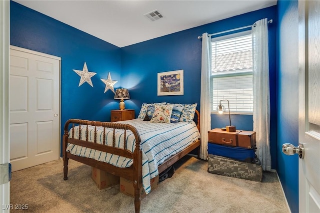 2558 Blossom Ave, Pahrump, NV 89048 - bedroom with carpet flooring, baseboards, and visible vents