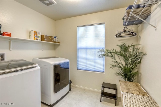 7445 Tinley Creek Ave, Las Vegas, NV 89113 - laundry area with independent washer and dryer, laundry area, and baseboards