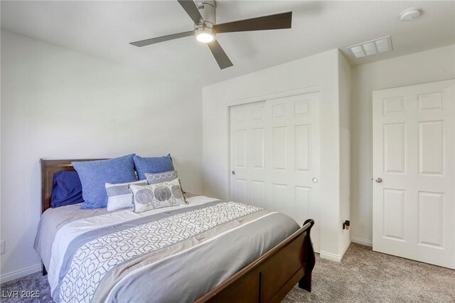 7445 Tinley Creek Ave, Las Vegas, NV 89113 - bedroom featuring visible vents, baseboards, a closet, a ceiling fan, and carpet flooring
