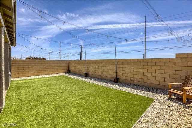 7445 Tinley Creek Ave, Las Vegas, NV 89113 - view of yard with a fenced backyard