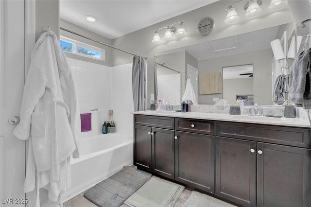 301 Resolute Ave, Henderson, NV 89011 - bathroom featuring shower / bath combination with curtain and double vanity