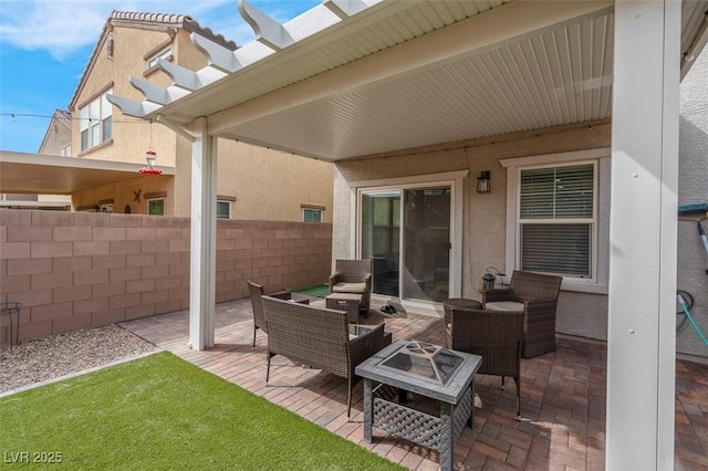301 Resolute Ave, Henderson, NV 89011 - view of patio / terrace featuring fence and an outdoor living space with a fire pit