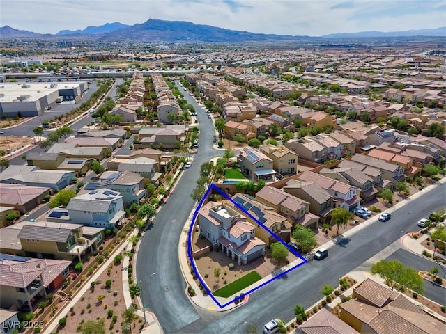 301 Resolute Ave, Henderson, NV 89011 - aerial view of residential area featuring a mountain backdrop and property parcel outlined