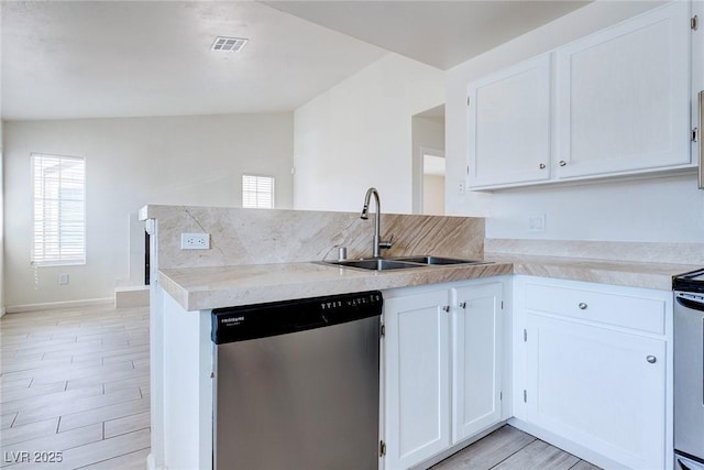 4732 Krissylouise Way, Las Vegas, NV 89121 - kitchen featuring a peninsula, light countertops, visible vents, stainless steel dishwasher, and a sink