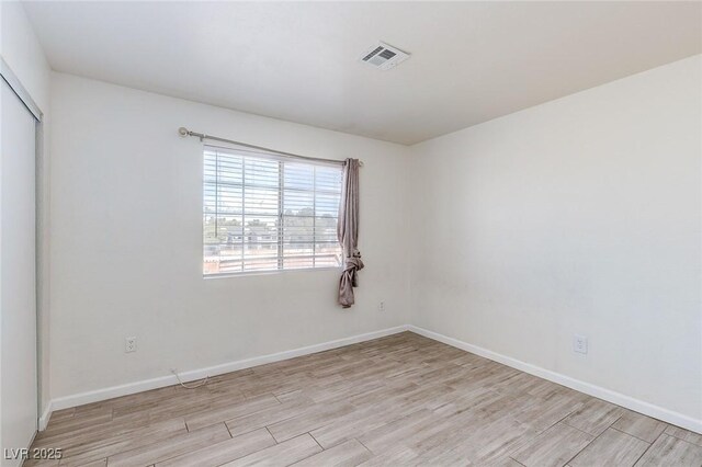 4732 Krissylouise Way, Las Vegas, NV 89121 - unfurnished room with light wood finished floors, baseboards, and visible vents