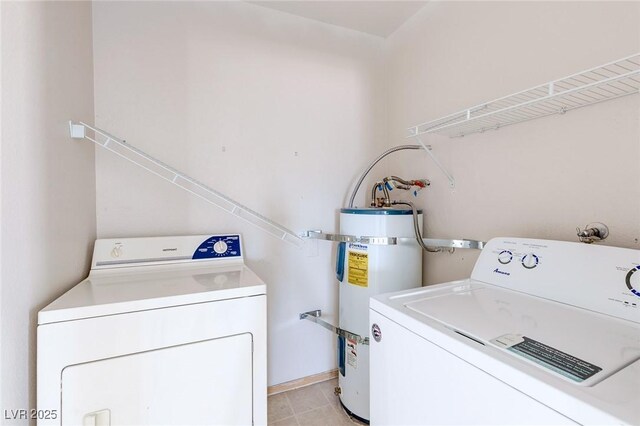 4732 Krissylouise Way, Las Vegas, NV 89121 - laundry room with strapped water heater, washer and clothes dryer, and laundry area