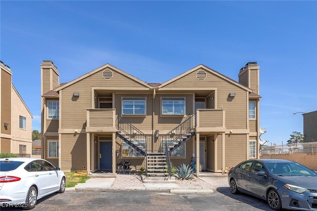 4732 Krissylouise Way, Las Vegas, NV 89121 - view of property with a chimney and stairway