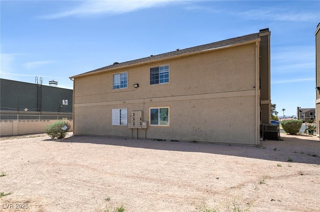 4732 Krissylouise Way, Las Vegas, NV 89121 - back of property featuring central air condition unit, fence, and stucco siding