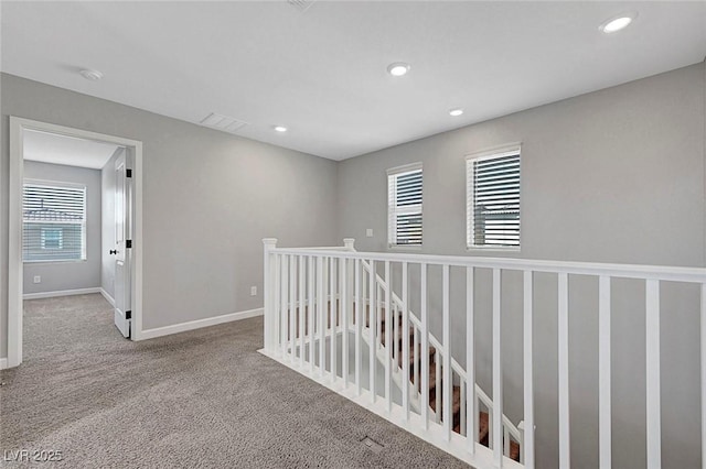 8349 Pollenzo Ave, Las Vegas, NV 89178 - hallway featuring carpet, baseboards, recessed lighting, and an upstairs landing